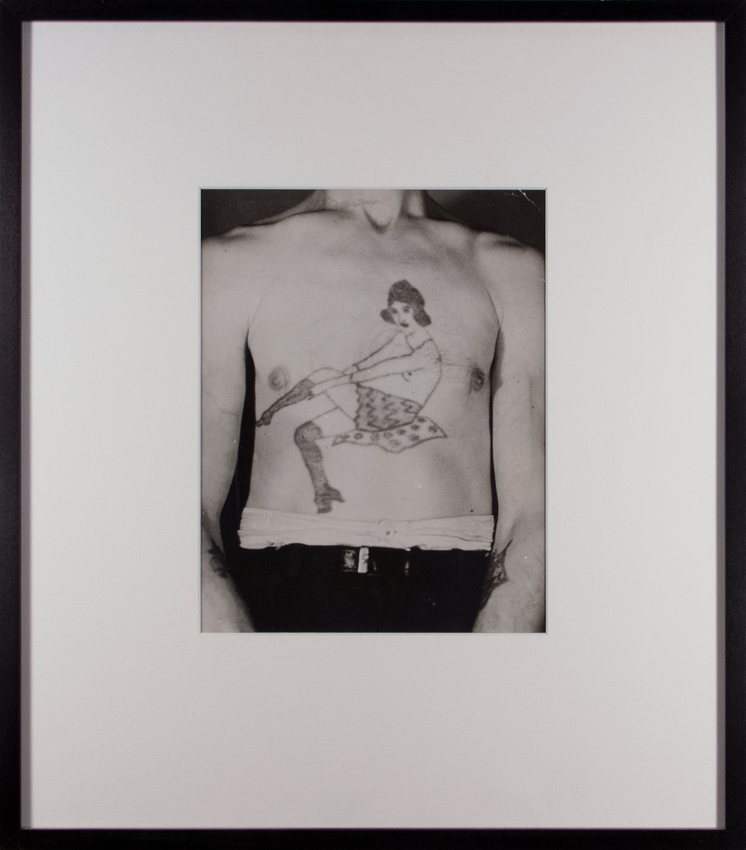 Vintage French police photo, Tattoos–man's chest with reclining woman tattoo
