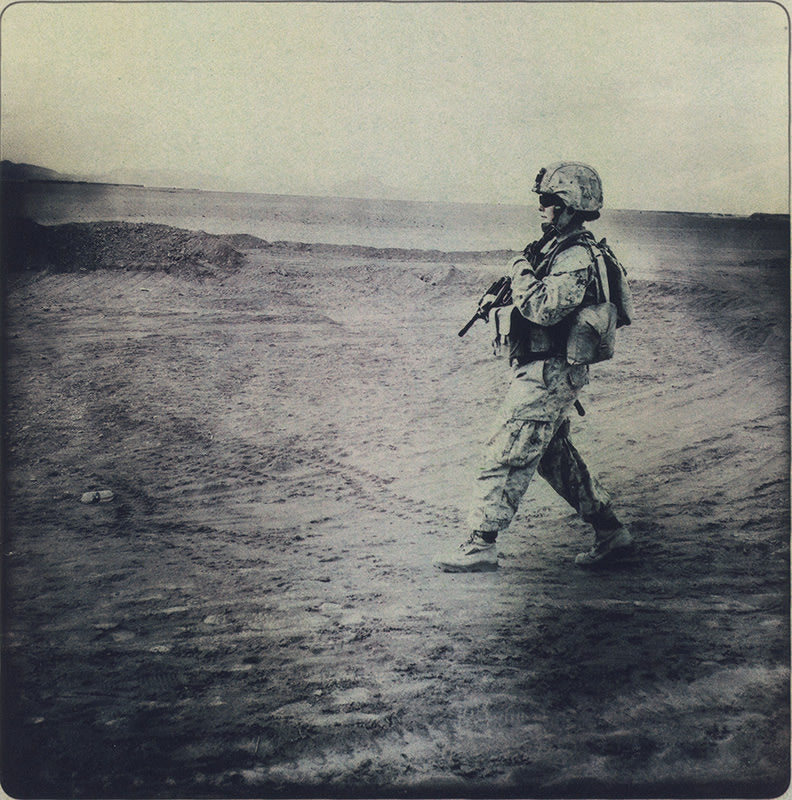 Wide shot of female Marine in desert - Rita Leistner | FFOTO