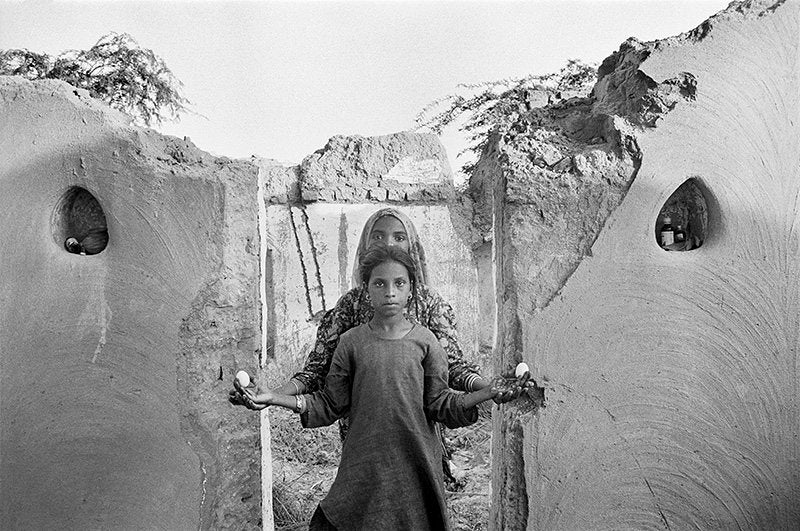 FFOTO-Gauri Gill-Karina and Nimli, in a home destroyed by flooding, Lunkaransar