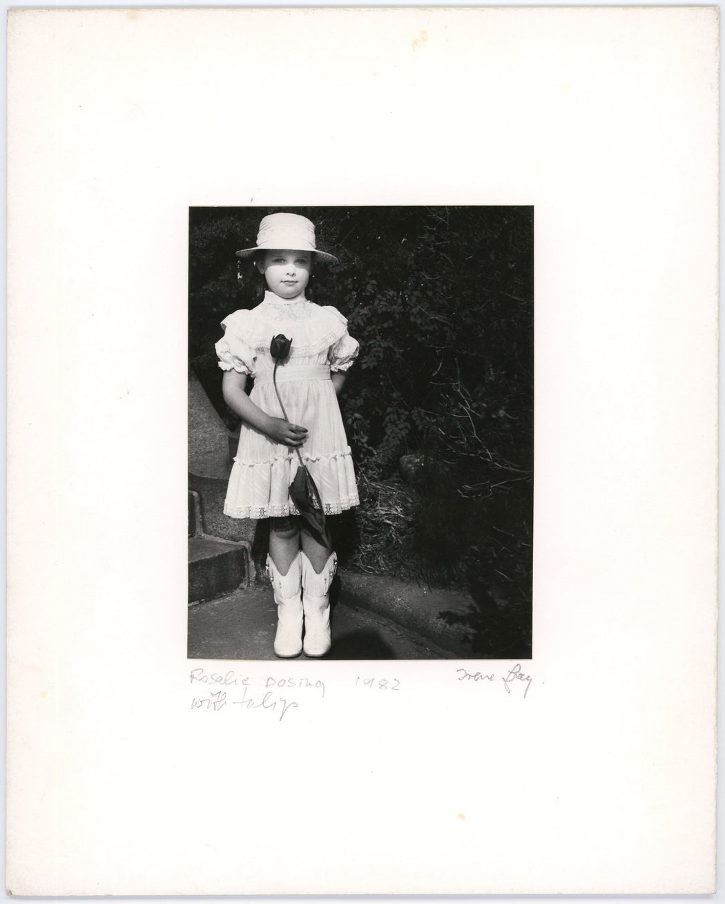 Rosalie Posing With Tulip