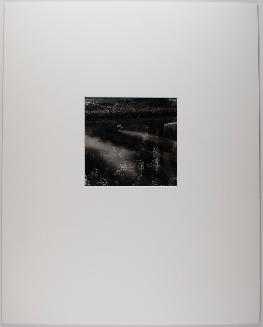 Man's Hat in River - II