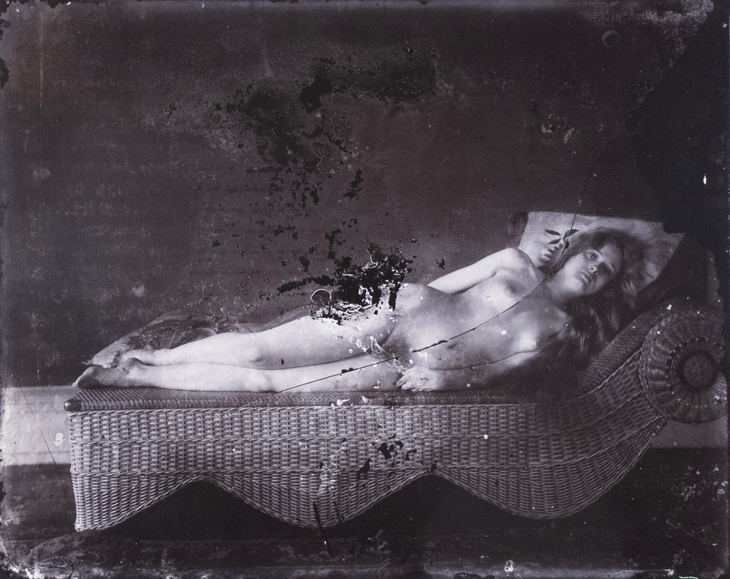 Untitled, (woman on wicker chaise) from Storyville, New Orleans