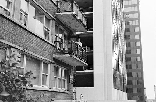 Sunil on the balcony, 3425 Stanley - Sunil Gupta | FFOTO