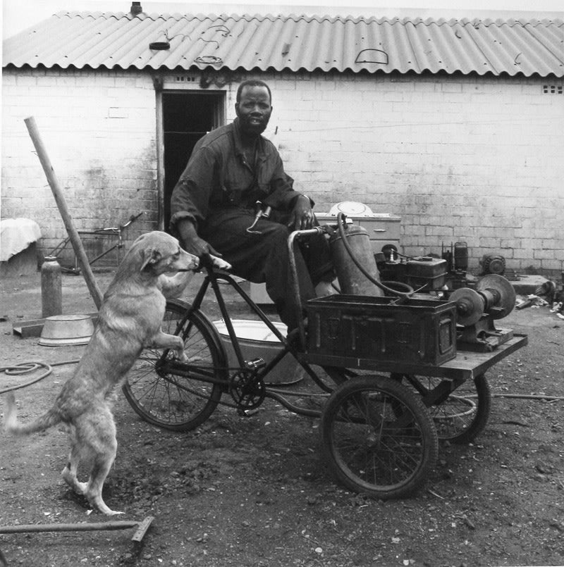 Untitled [Man with sharpening machine and dog] - David Goldblatt | FFOTO