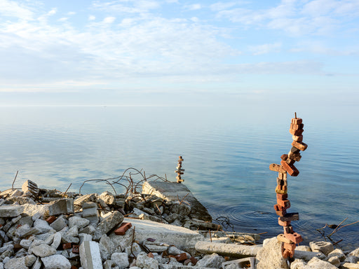 Shoreline of the Flats with brick and rebar constructions, Tommy Thompson Park, Toronto