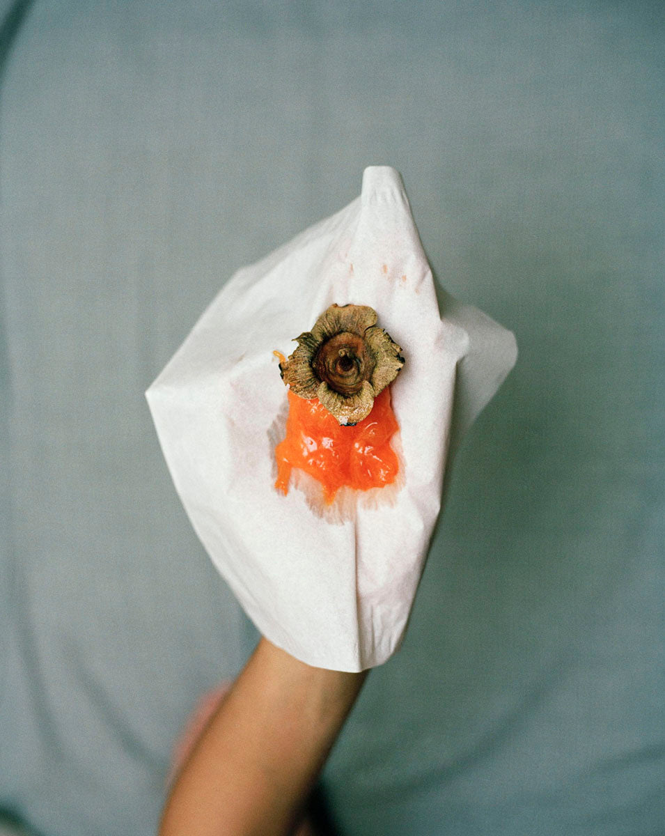 Hand with Tissue Persimmon