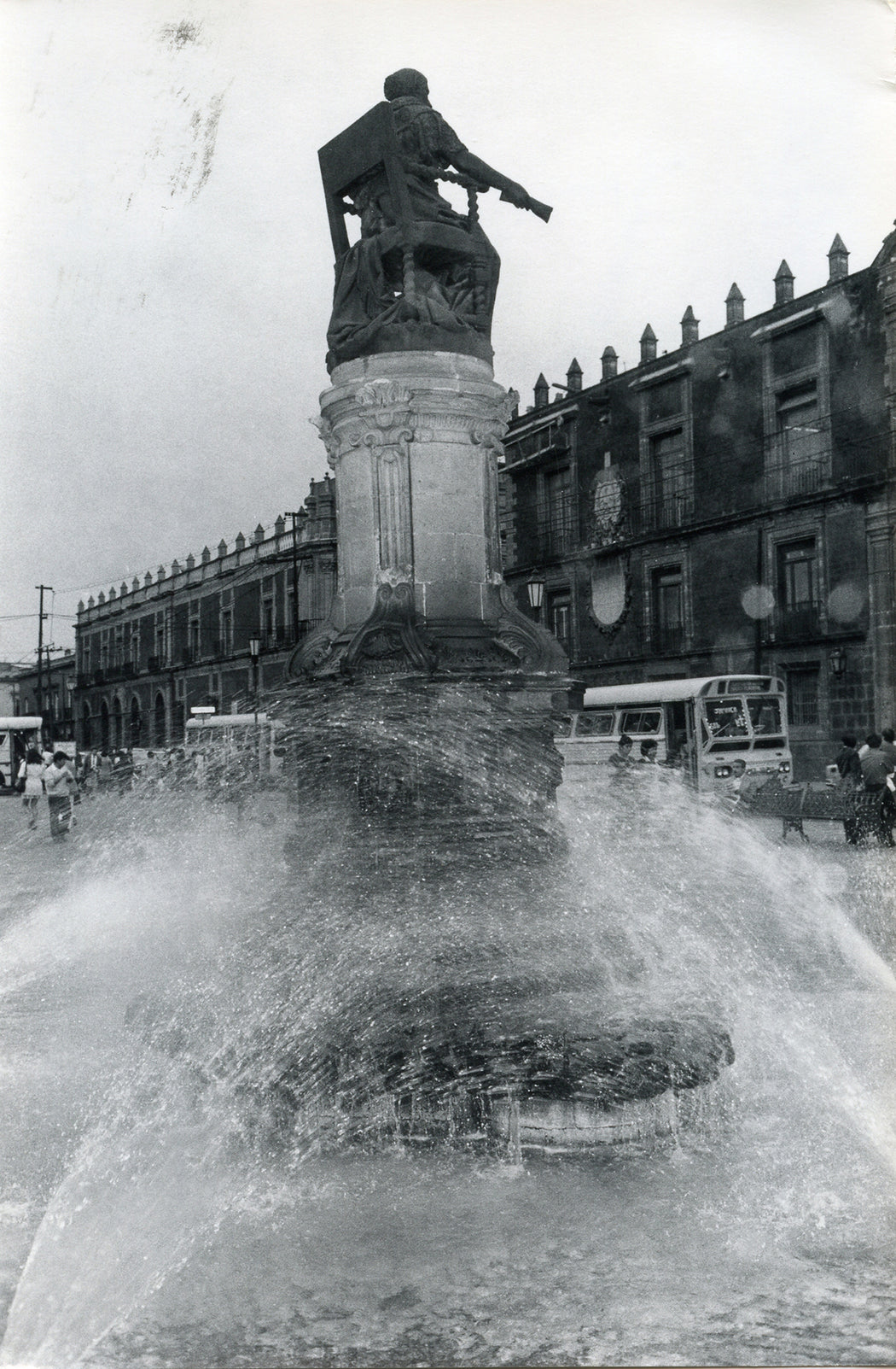 Untitled, Mexico [water fountains around statue in street]