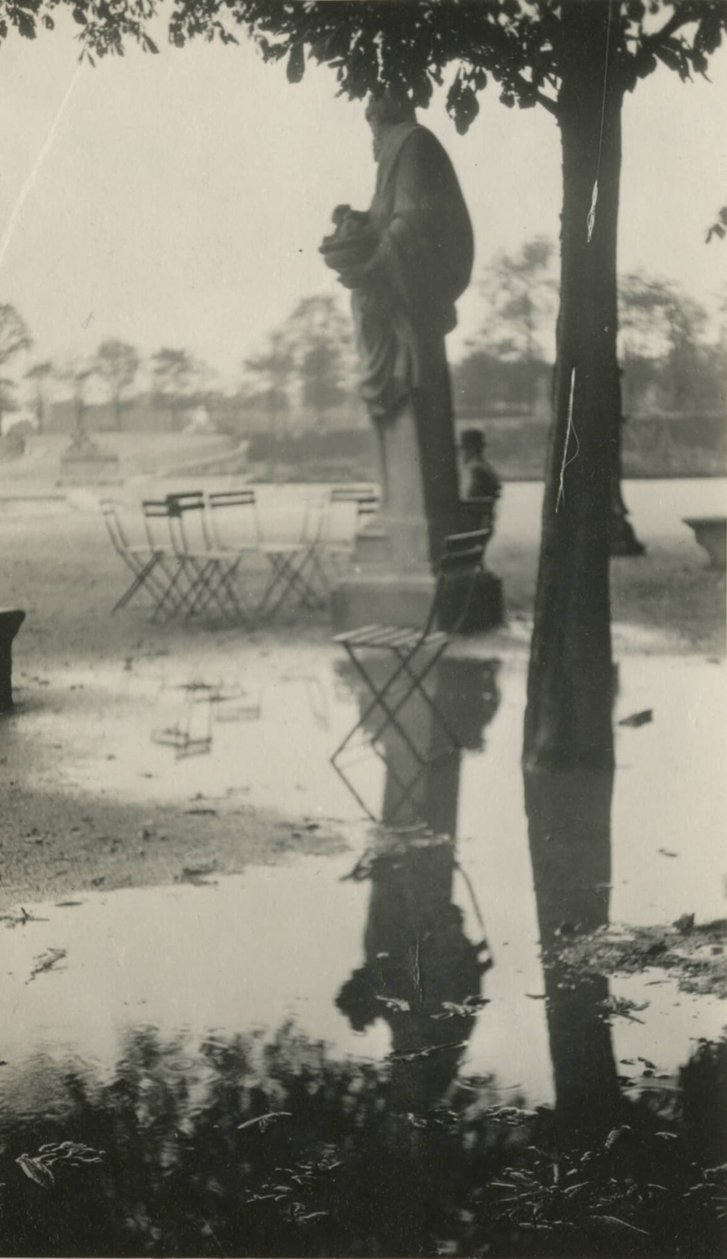 Untitled [chair in flooded field]