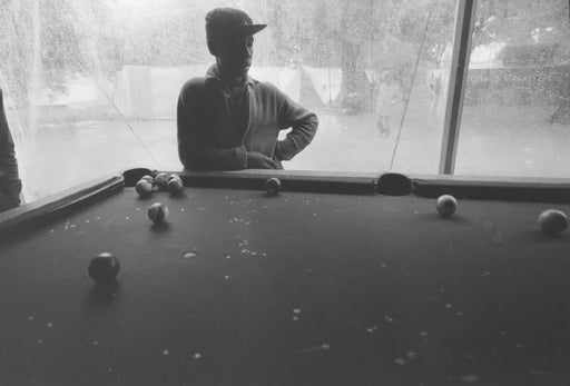 Untitled [Man in pool hall]