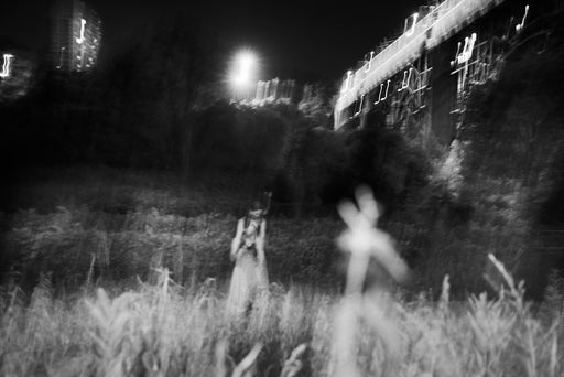 She Floats Beneath The Luminous Veil