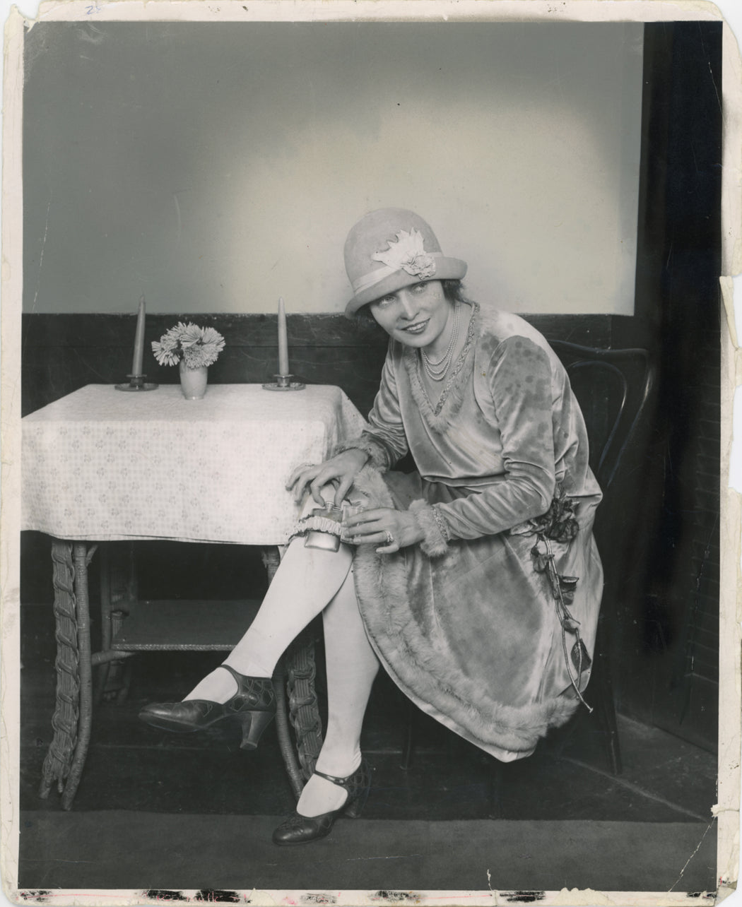 Prohibition – Miss Rhea Wearing Garter Flask