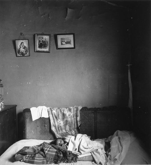 Untitled [Child on bed]