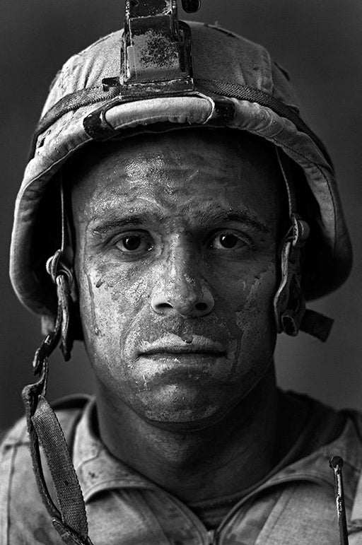 U.S. Marine Gunnery Sgt. Carlos “OJ” Orjuela age 31, Garmsir District, Helmand Province, Afghanistan, Forward Operating Base Dwyer. Carlos is from Neptune, New Jersey and he has done a tour of Iraq in addition to this tour. - Louie Palu | FFOTO